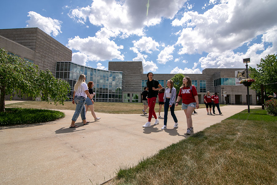 Students walking across the courtyard near Hunt Hall.