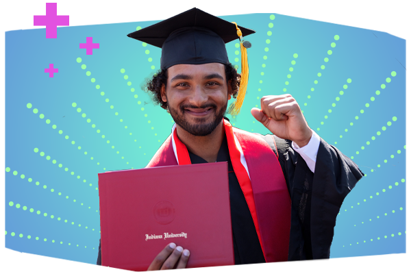 An IUK male graduate holding his diploma