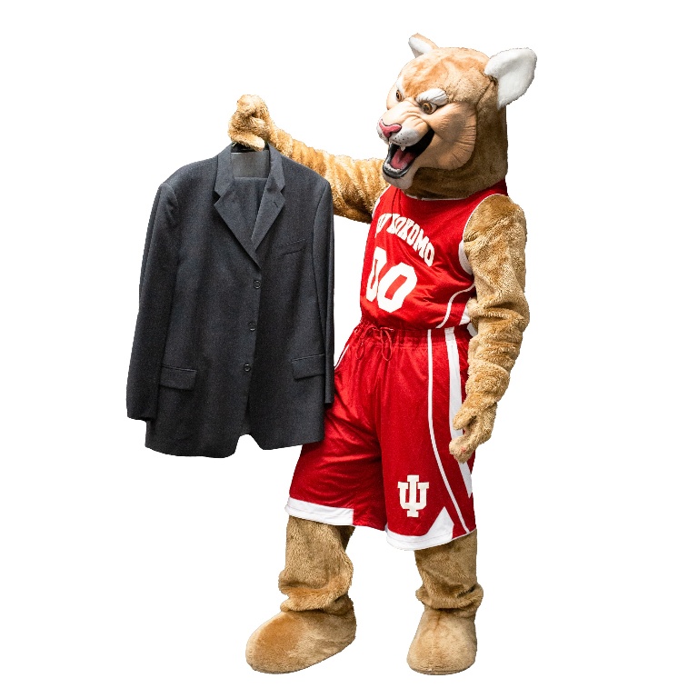 IUK Mascot Kingston holding a jacket