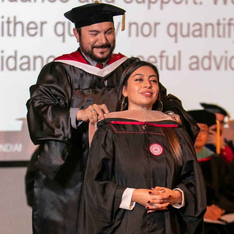 Graduate hooding ceremony.